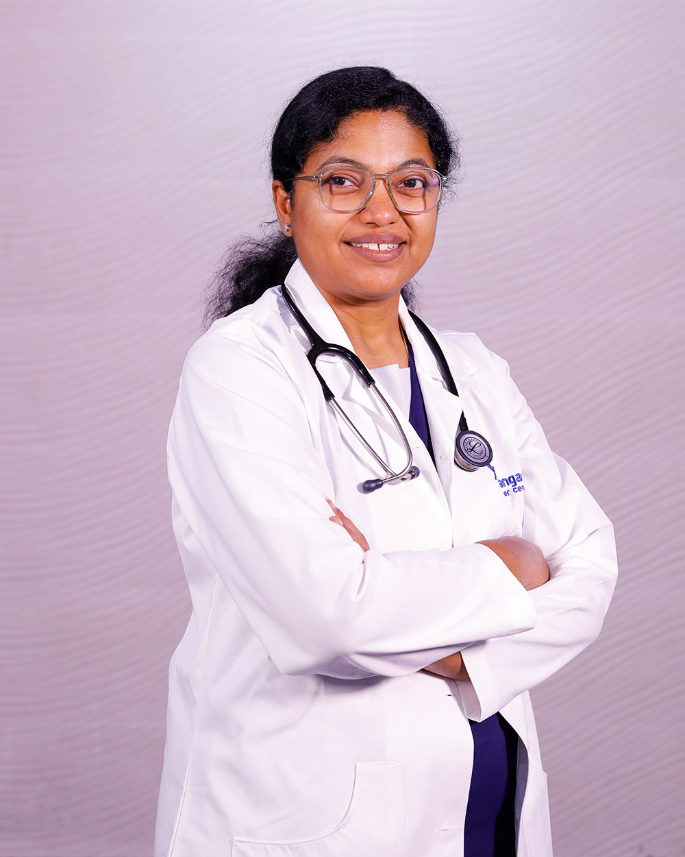 https://thangamcancercenter.com/file/wp-content/uploads/2024/07/Dr-Aruna-Prabhu-1.jpg