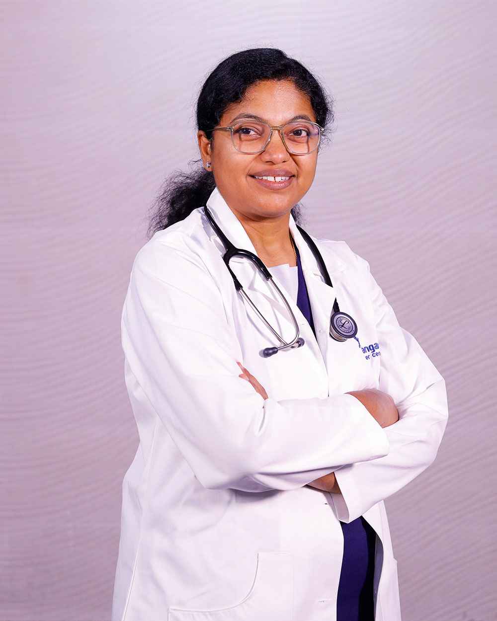 https://thangamcancercenter.com/file/wp-content/uploads/2024/07/Dr-Aruna-Prabhu.jpg